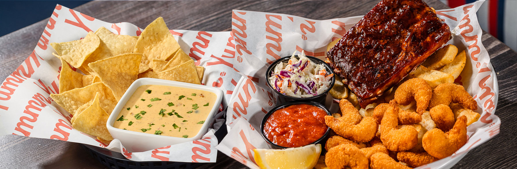 Dinner Double Feature - Whiskey River BBQ Ribs, Crispy Fried Shrimp, Bottomless Fries, andQueso Fundido